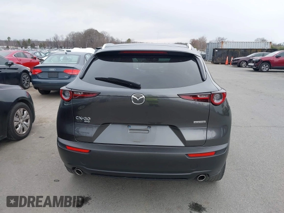 2022 Mazda CX-30 S Premium with VIN 3MVDMBDL9NM434619, listed as a IAAI auction lot 41620655 with 46,557 mi miles and . Bid and sale history available at carsss.com. Image 16.