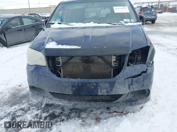 2013 Dodge Grand Caravan SE with VIN 2C4RDGBG4DR660309, listed as a IAAI auction lot 41531676 with 226,234 mi miles and . Bid and sale history available at DreamBid. Image 6.