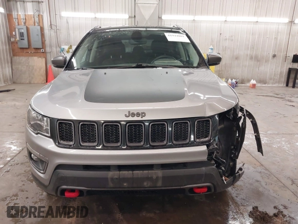2019 Jeep Compass Trailhawk with VIN 3C4NJDDB8KT667863, listed as a IAAI auction lot 41944001 with 80,635 mi miles and . Bid and sale history available at DreamBid. Image 13.