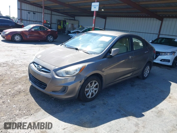 2014 Hyundai Accent GLS z VIN KMHCT4AE9EU671748, wystawiony jako IAAI lot #42356469 z przebiegiem 179 390 mil mil oraz . Historia ofert i sprzedaży dostępna na DreamBid. Obrazek 17.