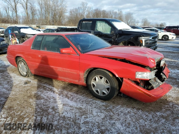 2002 Cadillac Eldorado z VIN 1G6EC12972B106132, wystawiony jako Copart lot #86799624 z przebiegiem 75 334 mil mil oraz Szkoda całkowita • Salvage title. Historia ofert i sprzedaży dostępna na DreamBid. Obrazek 4.