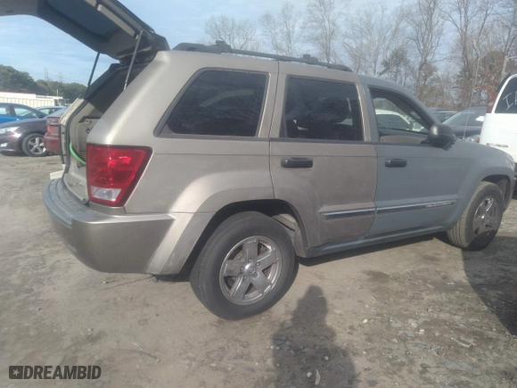 2005 Jeep Grand Cherokee Laredo with VIN 1J4HS48N95C677083, listed as a IAAI auction lot 41452025 with 236,773 mi miles. Bid and sale history available at carsss.com. Image 1.