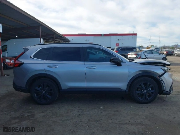 2023 Honda CR-V Hybrid Sport Touring with VIN 7FARS6H95PE004133, listed as a IAAI auction lot 41241806 with 82,427 mi miles. Bid and sale history available at carsss.com. Image 13.
