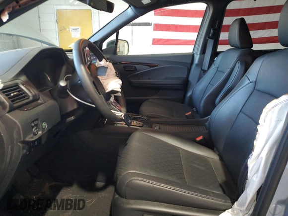 2023 Honda Passport Elite with VIN 5FNYF8H03PB034613, listed as a Copart auction lot 54009215 with 102,841 mi miles and Salvage title. Bid and sale history available at DreamBid. Image 7.