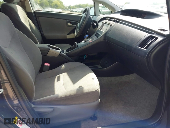 2012 Toyota Prius One z VIN JTDKN3DU4C1591831, wystawiony jako IAAI lot #41918102 z przebiegiem 167 443 mil mil oraz . Historia ofert i sprzedaży dostępna na DreamBid. Obrazek 5.