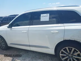 2019 Audi Q7 Premium Plus with VIN WA1LAAF70KD024096, listed as a IAAI auction lot 42564341 with 100,036 mi miles and . Bid and sale history available at DreamBid. Image 14.