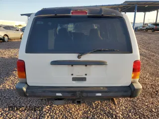 1997 Jeep Cherokee Sport z VIN 1J4FJ68S9VL594832, wystawiony jako Copart lot #53081675 z przebiegiem 167 028 mil mil oraz Czysty tytuł • Clean title. Historia ofert i sprzedaży dostępna na DreamBid. Obrazek 6.