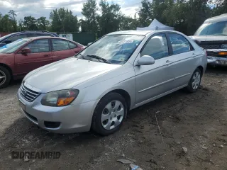 2009 Kia Spectra EX with VIN KNAFE221695615873, listed as a Copart auction lot 67671454 with 135,300 mi miles and Salvage Title. Bid and sale history available at carsss.com. Image 1.