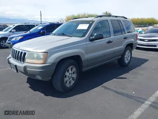 2001 Jeep Grand Cherokee Laredo with VIN 1J4GW48S81C708484, listed as a IAAI auction lot 41907414 with 1 mi miles. Bid and sale history available at carsss.com. Image 2.