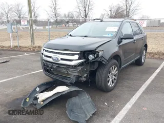 2013 Ford Edge SEL with VIN 2FMDK4JC0DBC52777, listed as a IAAI auction lot 41727385 with 167,006 mi miles. Bid and sale history available at carsss.com. Image 2.