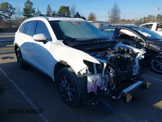 2021 Mazda CX-9 Touring z VIN JM3TCACY4M0522302, wystawiony jako IAAI lot #41323543 z przebiegiem 35 223 mil mil oraz . Historia ofert i sprzedaży dostępna na DreamBid. Obrazek 1.