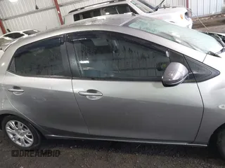 2013 Mazda 2 Sport with VIN JM1DE1KY1D0167999, listed as a IAAI auction lot 41713546 with 204,443 mi miles and . Bid and sale history available at DreamBid. Image 13.
