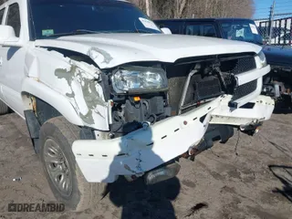 2004 Chevrolet Silverado 1500 Crew Cab Z71 with VIN 2GCEK13T641400781, listed as a IAAI auction lot 41888512 with 9,999,999 mi miles. Bid and sale history available at carsss.com. Image 6.