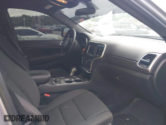 2018 Jeep Grand Cherokee Laredo E with VIN 1C4RJFAG4JC475993, listed as a IAAI auction lot 42295008 with 106,024 mi miles and . Bid and sale history available at DreamBid. Image 5.
