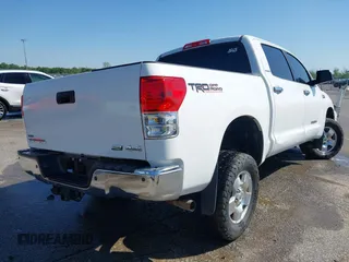 2012 Toyota Tundra 4WD Truck LTD with VIN 5TFHW5F1XCX269682, listed as a IAAI auction lot 41968019 with 166,074 mi miles. Bid and sale history available at carsss.com. Image 4.