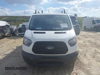 2019 Ford Transit z VIN 1FTYR2YM5KKA41176, wystawiony jako IAAI lot #41594906 z przebiegiem 76 637 mil mil oraz . Historia ofert i sprzedaży dostępna na DreamBid. Obrazek 13.