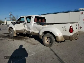 2014 Ford F-450 XL with VIN 1FT8W4DT4EEA08741, listed as a Copart auction lot 77214904 with 168,838 mi miles and Salvage title. Bid and sale history available at DreamBid. Image 2.
