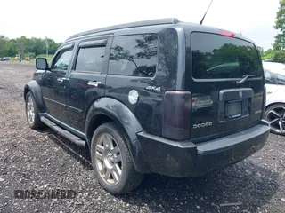 2010 Dodge Nitro SE z VIN 1D4PU2GK0AW142999, wystawiony jako IAAI lot #42549000 z przebiegiem 87 577 mil mil oraz . Historia ofert i sprzedaży dostępna na DreamBid. Obrazek 3.