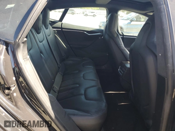 2016 Tesla Model S 90D with VIN 5YJSA1E2XGF129106, listed as a Copart auction lot 59162185 with 136,004 mi miles and Salvage title. Bid and sale history available at DreamBid. Image 10.