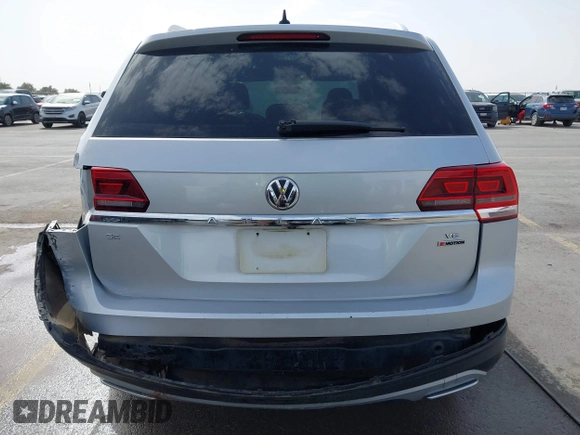 2018 Volkswagen Atlas SE with VIN 1V2KR2CA7JC546436, listed as a IAAI auction lot 41739327 with 123,916 mi miles and . Bid and sale history available at DreamBid. Image 16.