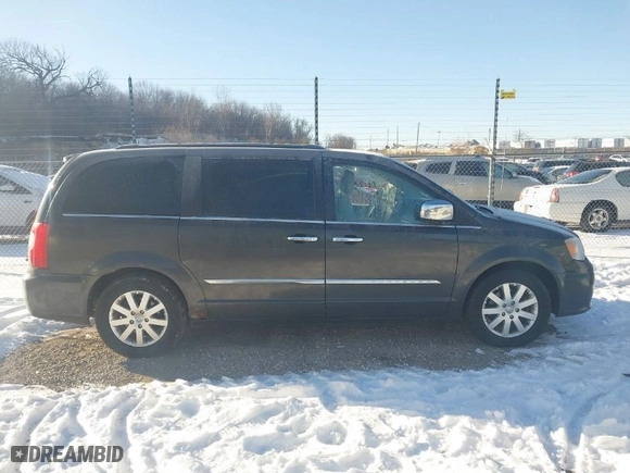 2012 Chrysler Town & Country Touring-L with VIN 2C4RC1CG9CR376817, listed as a IAAI auction lot 41628582 with 196,994 mi miles. Bid and sale history available at carsss.com. Image 13.