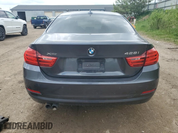 2014 BMW 4 Series 428i xDrive with VIN WBA3N9C56EF721399, listed as a Copart auction lot 57267675 with 154,685 mi miles and Clean title. Bid and sale history available at DreamBid. Image 6.
