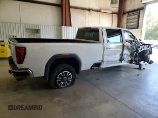 2021 GMC Sierra 1500 with VIN 1GT48ME7XMF253322, listed as a Copart auction lot 73474824 with 130,263 mi miles and Salvage Title. Bid and sale history available at DreamBid. Image 3.