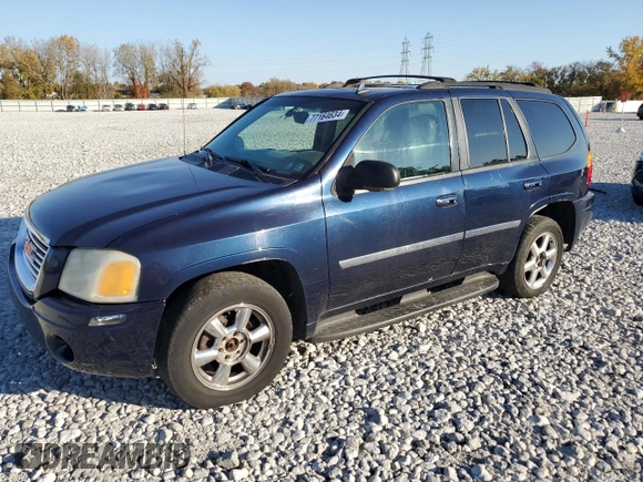 2008 GMC Envoy SLE2 with VIN 1GKDT13S882100069, listed as a Copart auction lot 77164634 with 206,709 mi miles and Salvage Title. Bid and sale history available at DreamBid. Image 1.