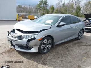 2018 Honda Civic EX-T z VIN 2HGFC1F34JH641837, wystawiony jako IAAI lot #41858089 z przebiegiem 65 318 mil mil oraz . Historia ofert i sprzedaży dostępna na DreamBid. Obrazek 17.