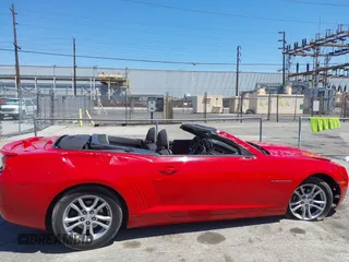 2013 Chevrolet Camaro LT z VIN 2G1FB3D34D9104778, wystawiony jako IAAI lot #42229416 z przebiegiem 99 123 mil mil oraz . Historia ofert i sprzedaży dostępna na DreamBid. Obrazek 19.