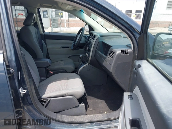 2007 Jeep Compass Sport with VIN 1J8FF47W17D597598, listed as a IAAI auction lot 42157027 with 153,043 mi miles and . Bid and sale history available at carsss.com. Image 5.