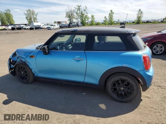2017 MINI Hardtop Cooper with VIN WMWXP5C33H2G60921, listed as a Copart auction lot 58139295 with 94,599 mi miles and Salvage title. Bid and sale history available at DreamBid. Image 2.