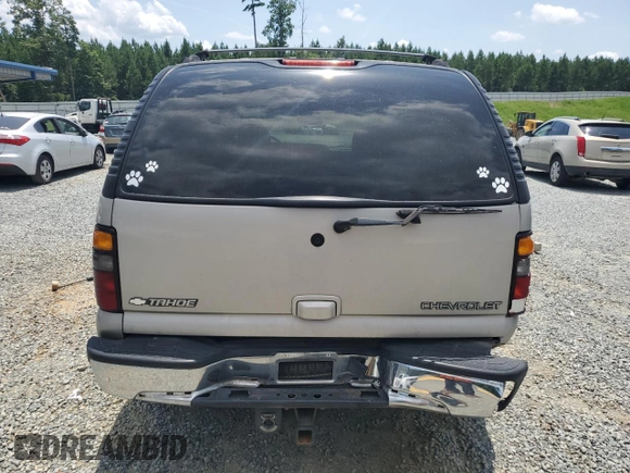 2004 Chevrolet Tahoe LT with VIN 1GNEC13Z84R196100, listed as a Copart auction lot 62810484 with 220,759 mi miles and Salvage Title. Bid and sale history available at carsss.com. Image 6.