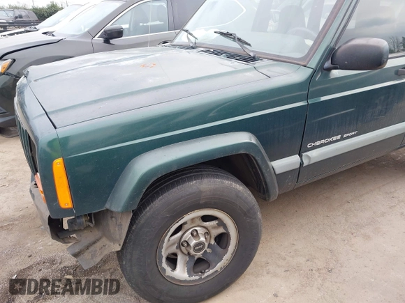 2000 Jeep Cherokee with VIN 1J4FT48S6YL102373, listed as a IAAI auction lot 41685817 with 214,106 mi miles and . Bid and sale history available at DreamBid. Image 14.