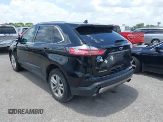 2020 Ford Edge SEL with VIN 2FMPK3J99LBA59621, listed as a IAAI auction lot 42513247 with 163,466 mi miles and . Bid and sale history available at DreamBid. Image 3.