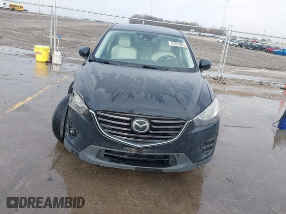 2016 Mazda CX-5 Grand Touring with VIN JM3KE4DY3G0769448, listed as a IAAI auction lot 41947725 with 154,051 mi miles and . Bid and sale history available at carsss.com. Image 19.