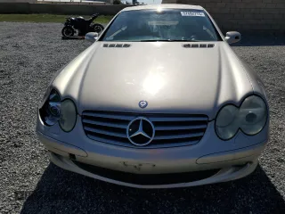 2003 Mercedes-Benz SL 500 z VIN WDBSK75F83F056017, wystawiony jako Copart lot #57662775 z przebiegiem 264 449 mil mil oraz Czysty tytuł • Clean title. Historia ofert i sprzedaży dostępna na DreamBid. Obrazek 5.