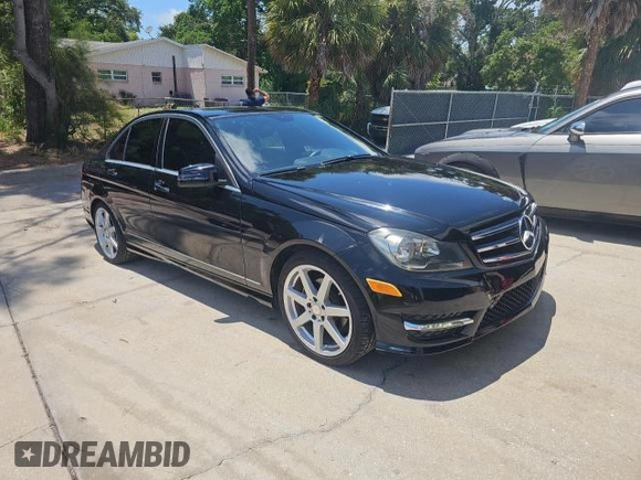 2014 Mercedes-Benz C 250 Sport with VIN WDDGF4HB3EA957269, listed as a Copart auction lot 65226545 with 100,479 mi miles and Clean title. Bid and sale history available at DreamBid. Image 1.