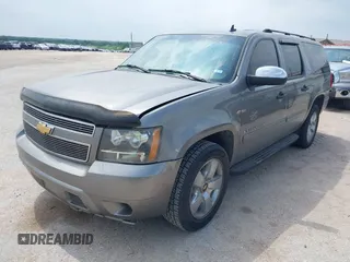 2007 Chevrolet Suburban LS with VIN 1GNFC160X7J233586, listed as a IAAI auction lot 42165186 with 240,183 mi miles and . Bid and sale history available at DreamBid. Image 2.