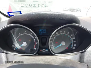 2016 Ford Fiesta SE z VIN 3FADP4BJXGM156814, wystawiony jako IAAI lot #42129721 z przebiegiem 90 353 mil mil oraz . Historia ofert i sprzedaży dostępna na DreamBid. Obrazek 7.