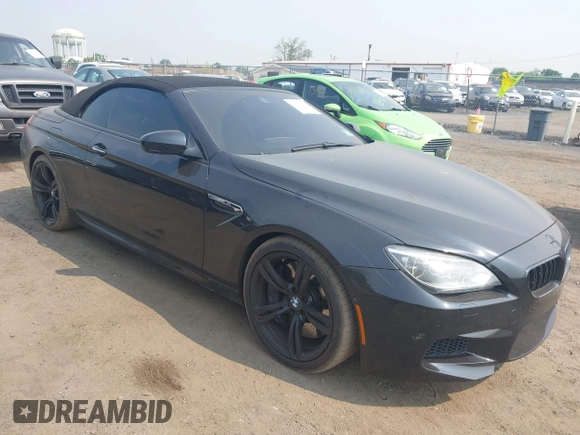 2014 BMW M6 z VIN WBSLZ9C5XEDZ78402, wystawiony jako IAAI lot #42399055 z przebiegiem 127 803 mil mil oraz . Historia ofert i sprzedaży dostępna na DreamBid. Obrazek 1.