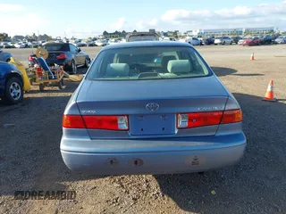 2000 Toyota Camry CE with VIN 4T1BG22K6YU000857, listed as a IAAI auction lot 42118645 with 244,448 mi miles and . Bid and sale history available at carsss.com. Image 16.