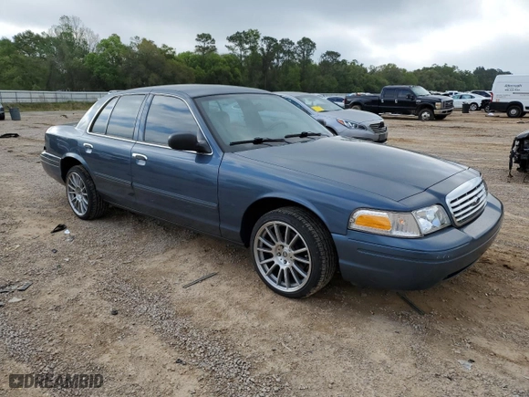 2009 Ford Crown Victoria LX with VIN 2FAHP74V79X124042, listed as a Copart auction lot 50974145 with 115,223 mi miles and Salvage Title. Bid and sale history available at carsss.com. Image 4.