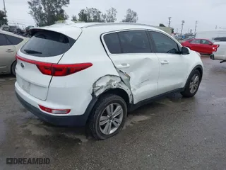 2019 Kia Sportage LX with VIN KNDPM3AC6K7508870, listed as a IAAI auction lot 41808770 with 104,141 mi miles. Bid and sale history available at carsss.com. Image 4.