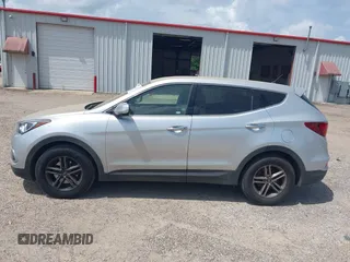 2018 Hyundai Santa Fe 2.4L with VIN 5XYZT3LB4JG557373, listed as a IAAI auction lot 42511741 with 142,572 mi miles and . Bid and sale history available at DreamBid. Image 15.