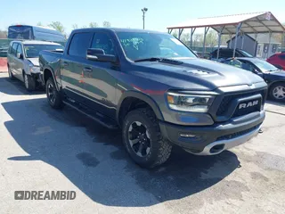 2019 Ram 1500 Rebel with VIN 1C6SRFLT6KN565163, listed as a IAAI auction lot 41984303 with 82,494 mi miles and . Bid and sale history available at DreamBid. Image 1.