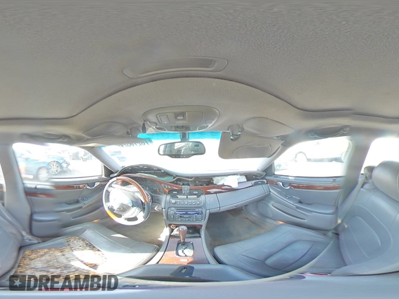 2004 Cadillac DeVille DTS z VIN 1G6KF57994U203706, wystawiony jako Copart lot #76278324 z przebiegiem 203 709 mil mil oraz Szkoda całkowita • Salvage title. Historia ofert i sprzedaży dostępna na DreamBid. Obrazek 13.