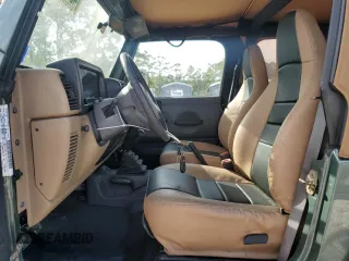 2000 Jeep Wrangler SE with VIN 1J4FA29P6YP753791, listed as a Copart auction lot 43945135 with 162,532 mi miles and Salvage Title. Bid and sale history available at carsss.com. Image 7.