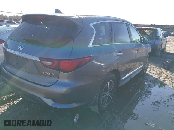 2019 Infiniti QX60 LUXE with VIN 5N1DL0MN7KC532048, listed as a IAAI auction lot 41206582 with 77,675 mi miles. Bid and sale history available at carsss.com. Image 4.