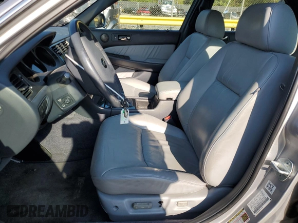 2004 Acura RL w/Navigation System with VIN JH4KA96664C005194, listed as a Copart auction lot 72174224 with 71,304 mi miles and Salvage Title. Bid and sale history available at carsss.com. Image 7.